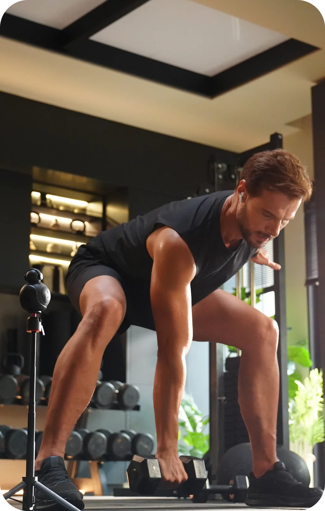 Man lifting weights in a gym
